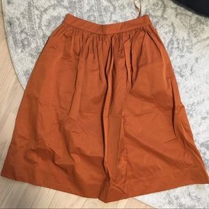 Rust colored full midi skirt with pockets